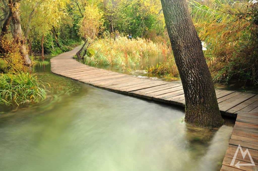 bridge with water flowing over it in Croatia